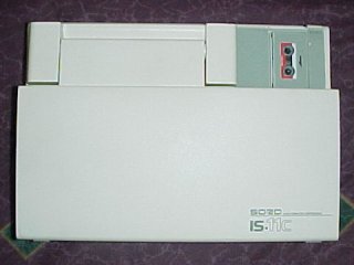 The Sord IS-11C, when closed, looks a lot like the NEC PC-8401A, except for the microcassette in the upper right corner. 